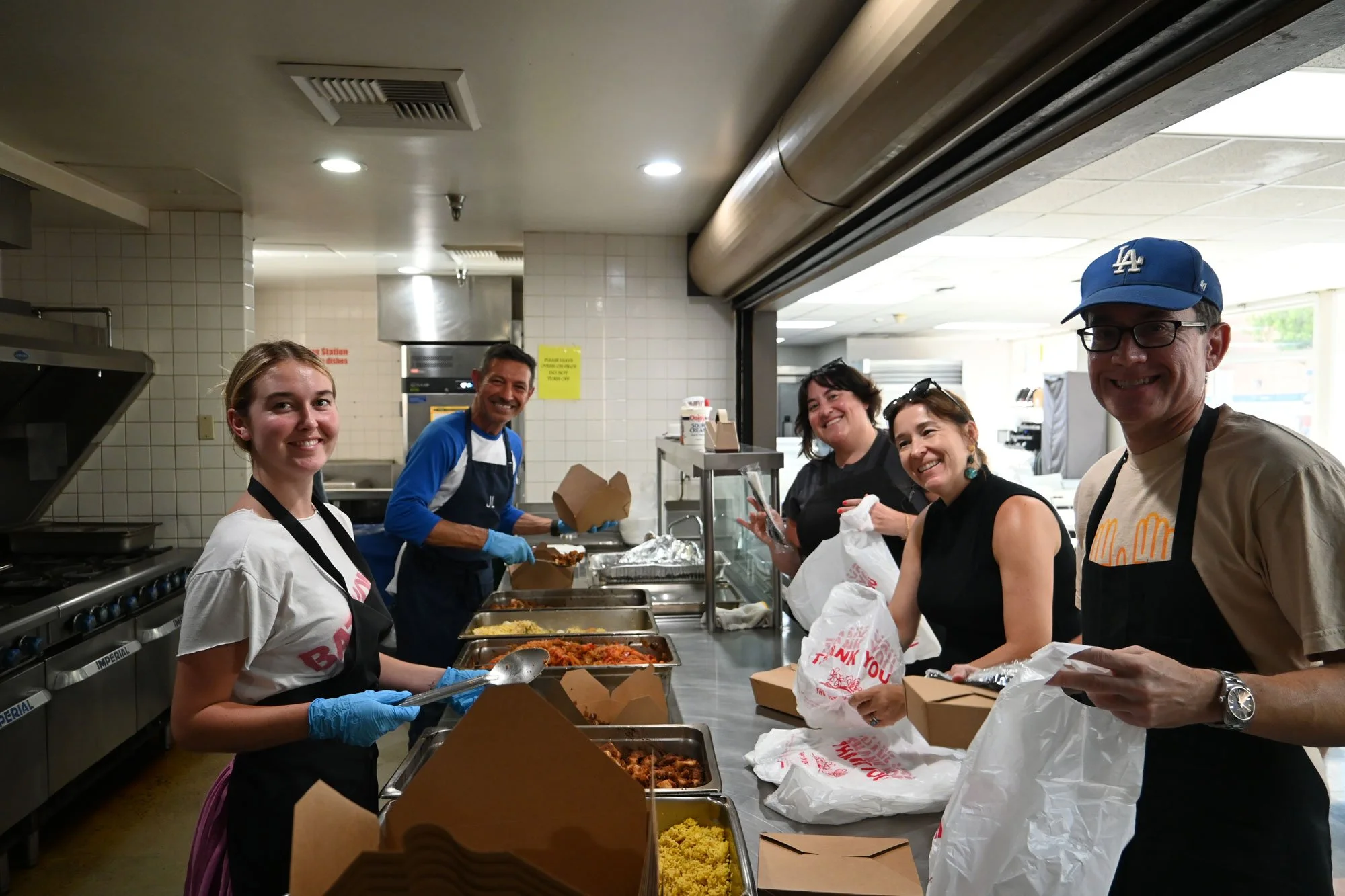 HoFoCo volunteers packing meals