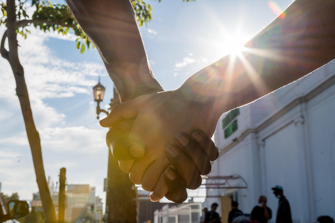 Image of holding hands