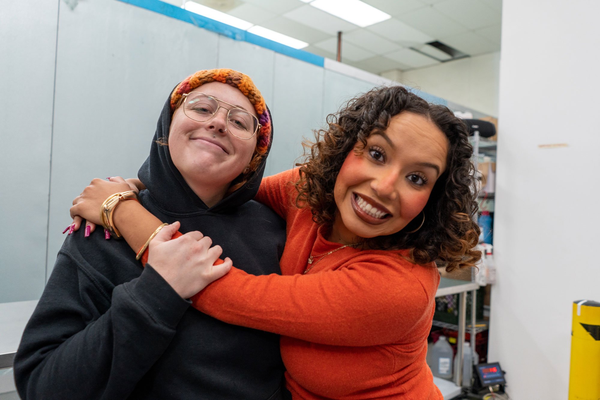 Two women hugging at the Exchange