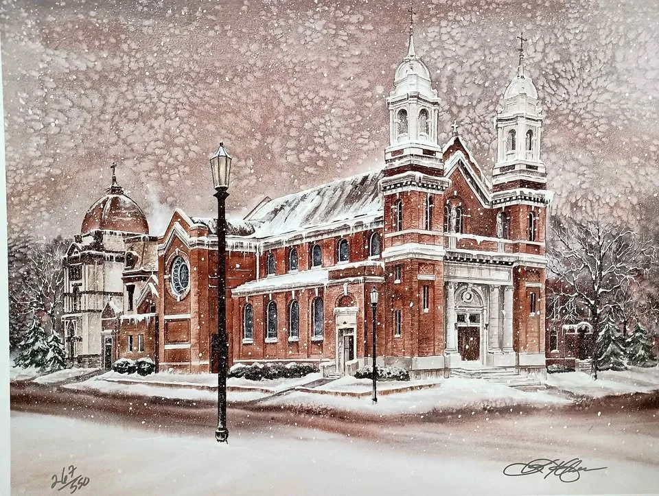 A painting of a historic brick church with twin steeples, snow-covered ground, trees, and streetlamps during a snowfall.