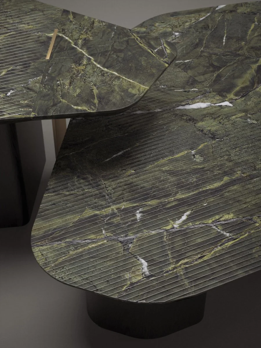 Detail of Leaf Collection table in green marble with fluted surface texture.