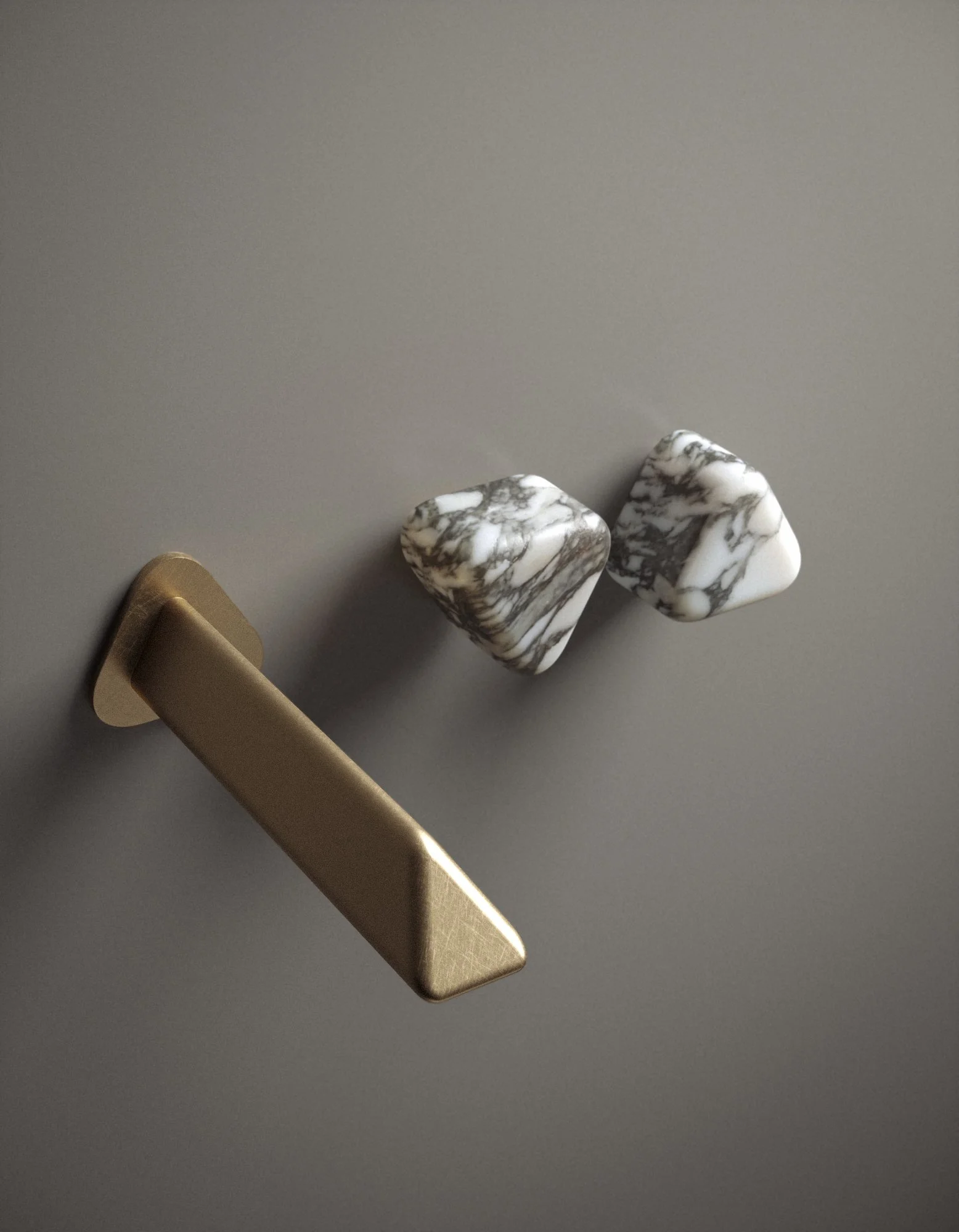 Wall-mounted faucet from Trinity Collection by Jenny Ly Studio, featuring brass finish and sculpted marble handles inspired by river stones.