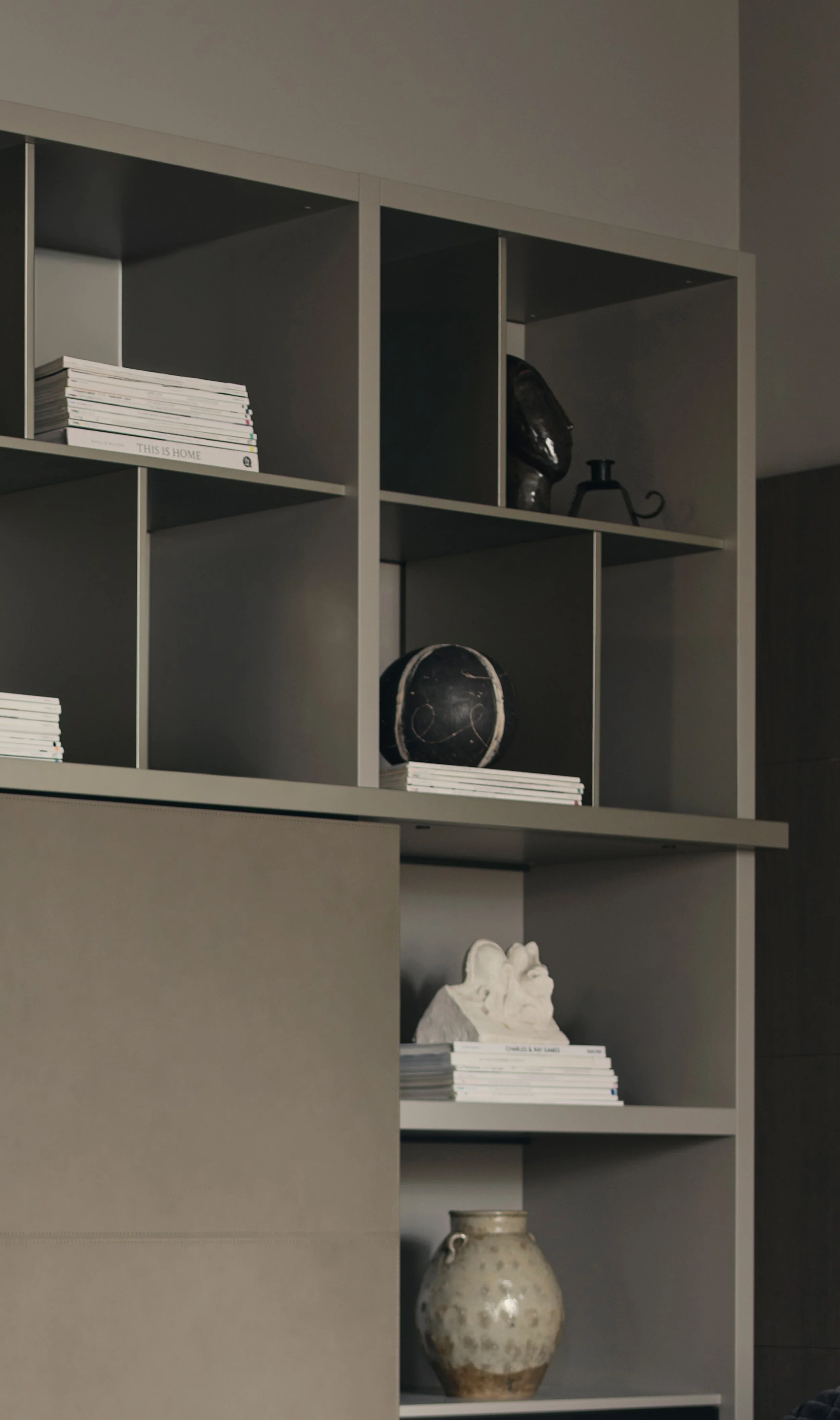 Interior design detail by Jenny Ly Studio — custom shelving with ceramics and neutral palette in Holland Park Residence, London.
