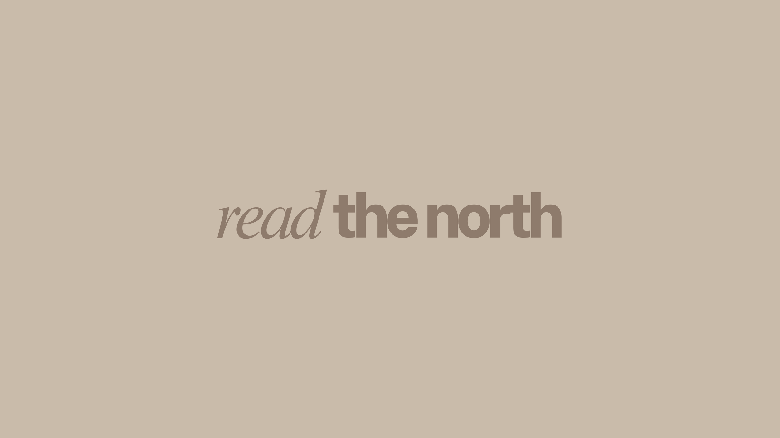 Text on beige background reading 'read the north' with 'read' in italics and 'the north' in bold.