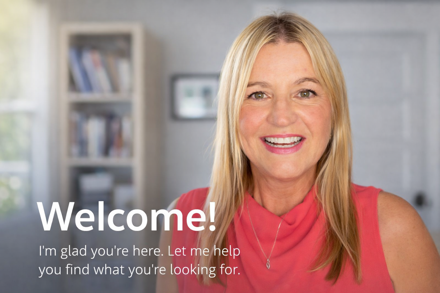 A smiling woman with blonde hair wearing a pink sleeveless top in a well-lit room with a bookshelf in the background, welcoming viewers with text that says, "Welcome! I'm glad you're here. Let me help you find what you're looking for."