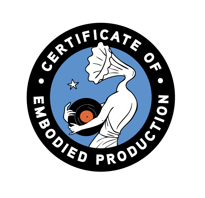 A certification badge with a black background, featuring a stylized female figure with a large, mushroom-shaped hairdo, holding a vinyl record with an orange label, a star, and the text 'CERTIFICATE OF EMBODIED PRODUCTION' encircling the figure.