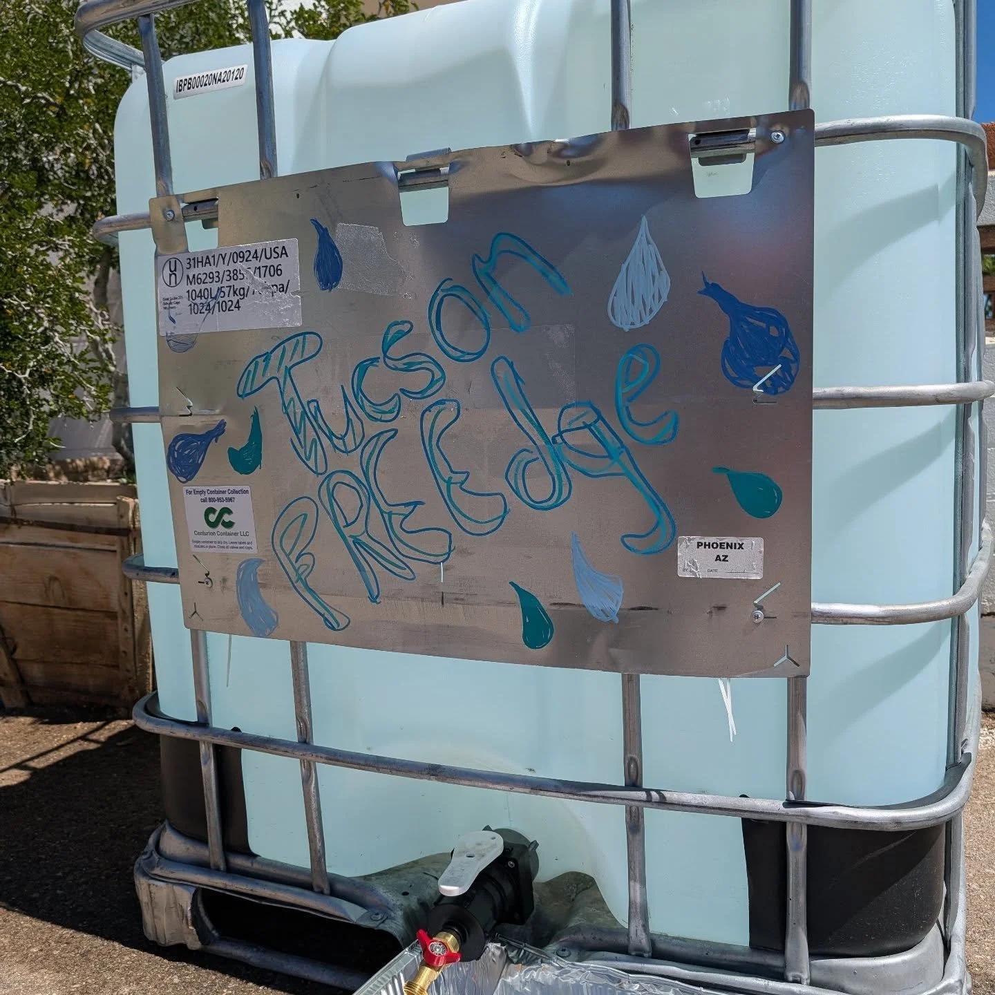 Woohoo!! The first of our water solutions has officially been deployed! We didn't get it attached just right so it drips a little but we can fix that next time it's empty -- which will probably be soon! For now though it functions as a gently filling