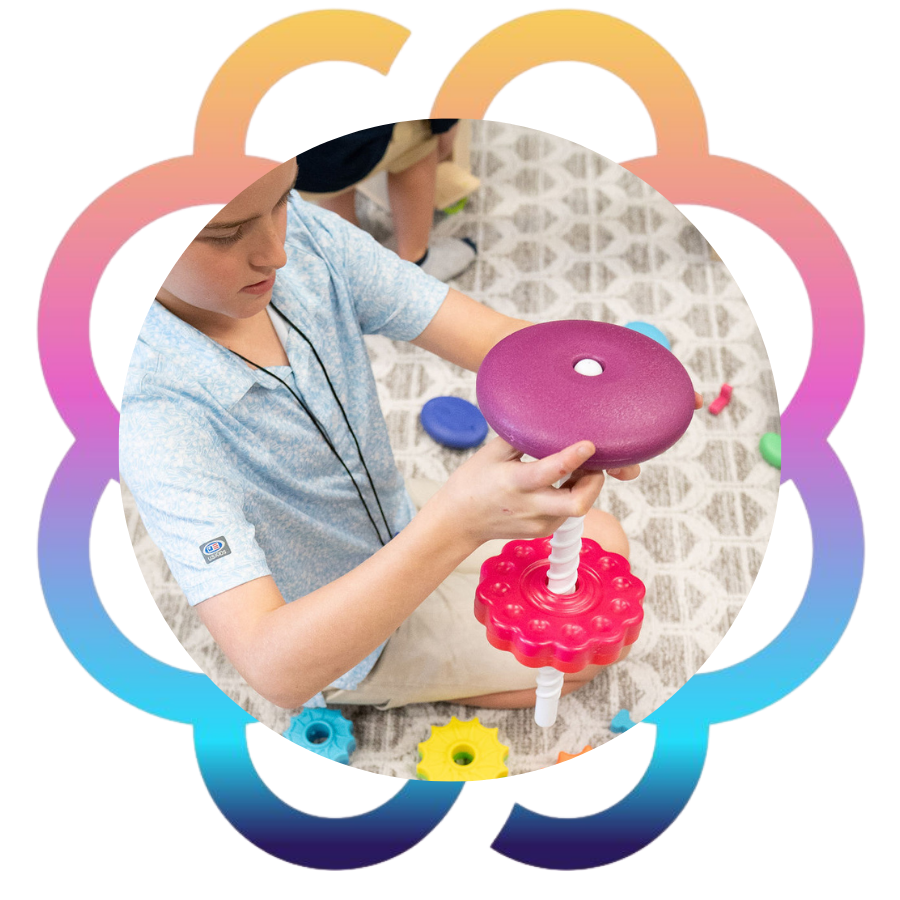 Child engaged in personalized therapy for developmental and behavioral needs — compassionate special needs support at 8GK Consulting.