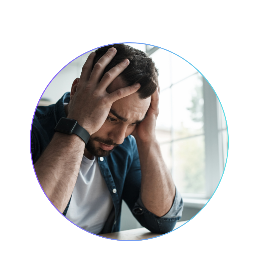 Person experiencing anxiety and stress while sitting alone, representing mental health awareness and emotional well-being.