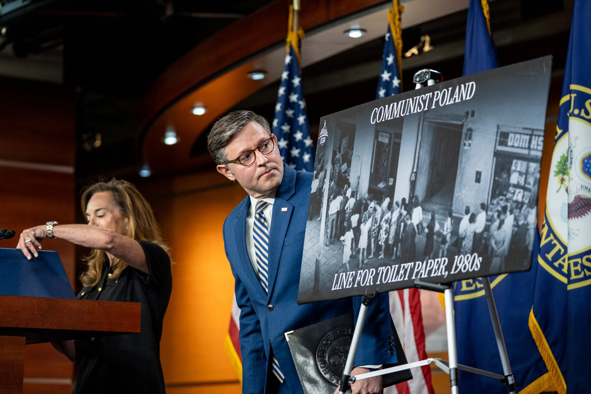 Speaker of the House Mike Johnson (R-La.) looks toward a display about life in communist Poland during a press conference at the U.S. Capitol in Washington, D.C. on July 21, 2026.