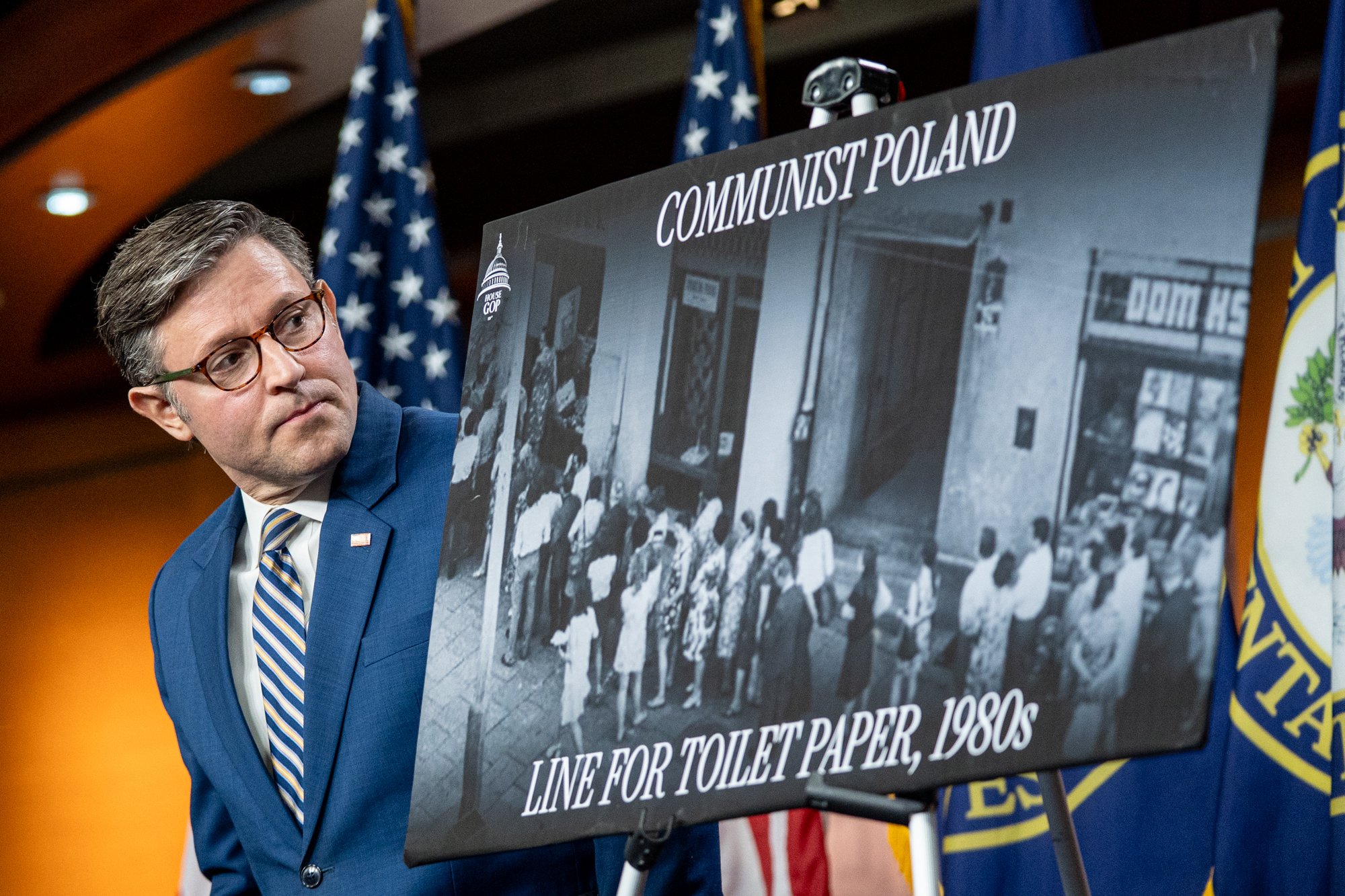Speaker of the House Mike Johnson (R-La.) looks toward a display about life in communist Poland during a press conference at the U.S. Capitol in Washington, D.C. on July 21, 2026.