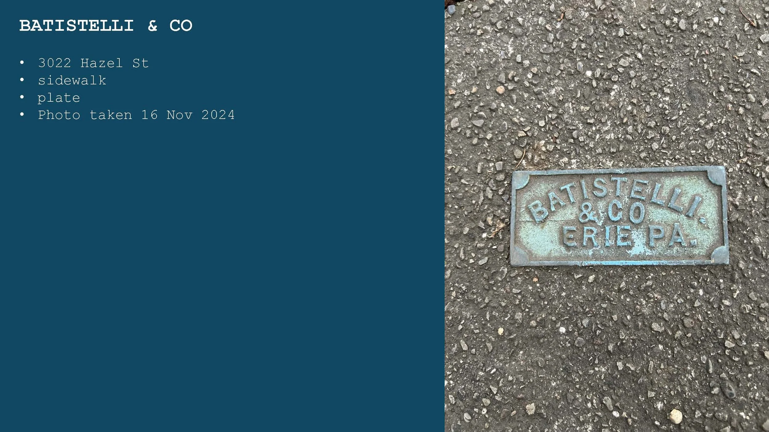 Photograph of a blue sidewalk plaque showing 'BATISTELLI & CO ERIE PA' on a paved sidewalk.