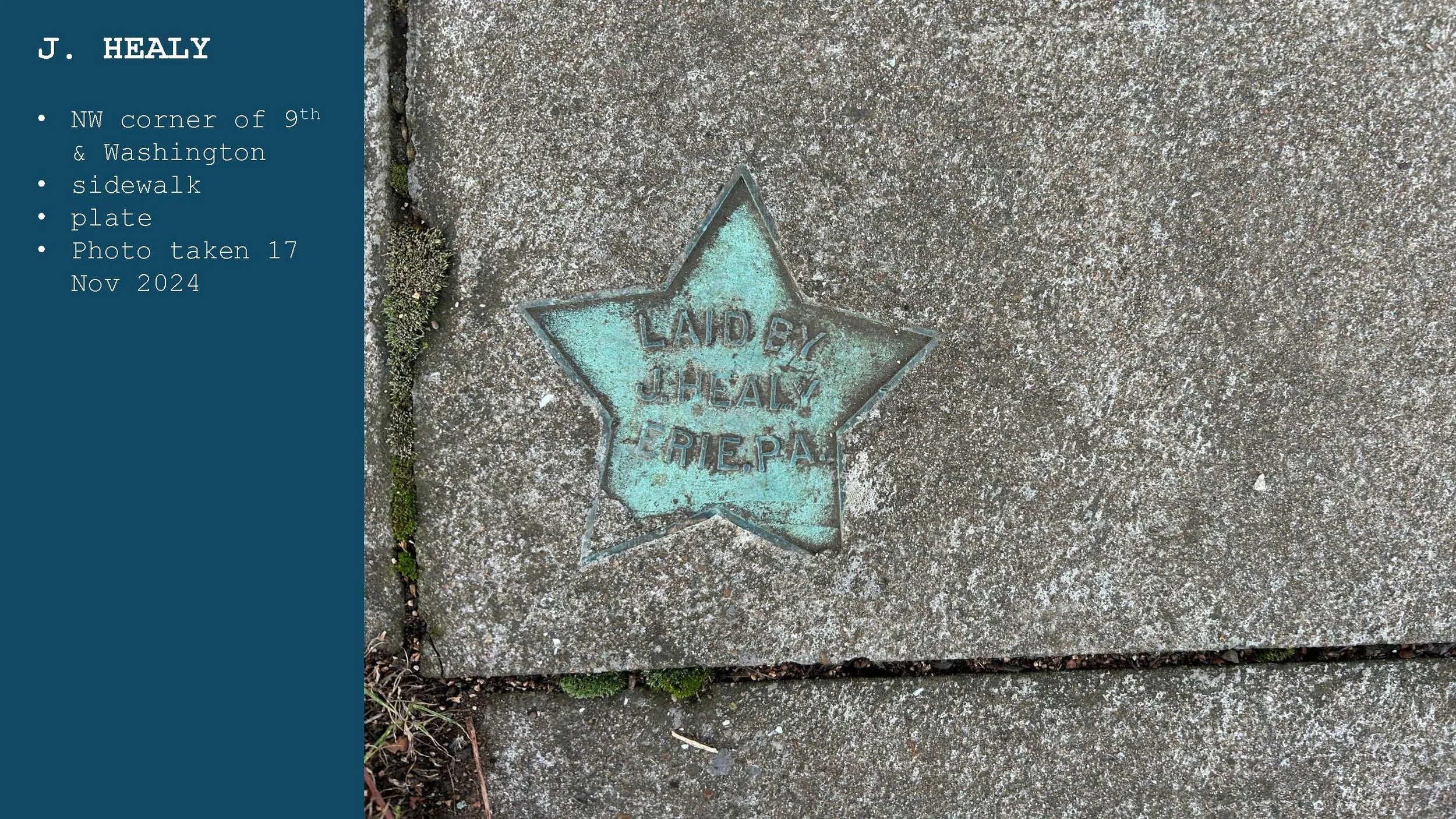 A star-shaped plaque embedded in a sidewalk with the words 'LAID BY J. HEALY L. RIEPAL' inscribed inside, situated on a concrete sidewalk with some moss and dirt around the edges.