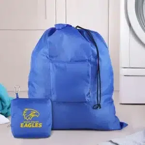 A blue drawstring backpack and a matching small blue case with a yellow eagle logo.