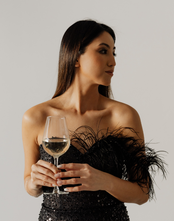 kaboompics_classy-aesthetics-beautiful-asian-woman-in-black-evening-dress-white-wine-in-a-glass-29512.png