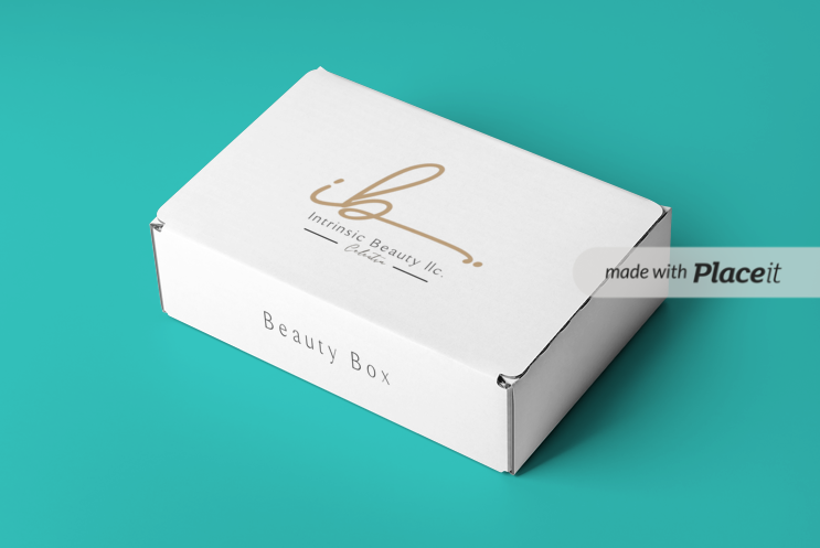 White beauty box with gold logo and text, placed on a teal background.