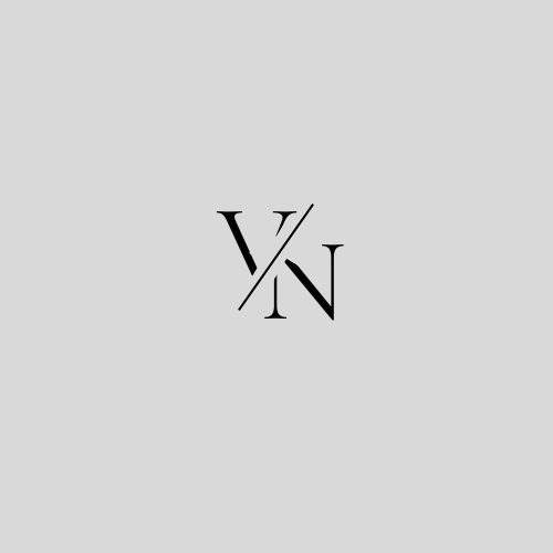 The Voiture Noire monogram logo featuring an elegant interlocked V and N lettermark in black, reflecting the brand's sophisticated identity and exclusive white-glove automotive consulting service.