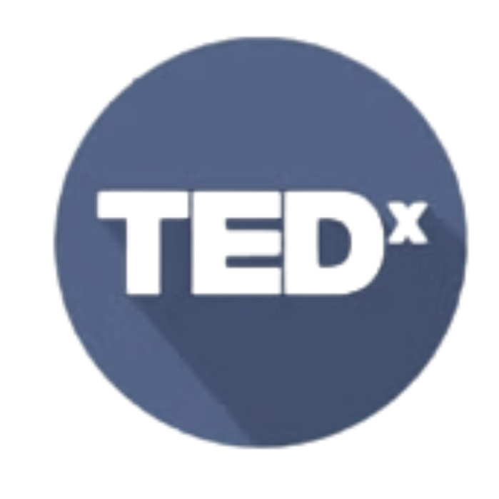 TED logo with a gray circle background and shadow effect.