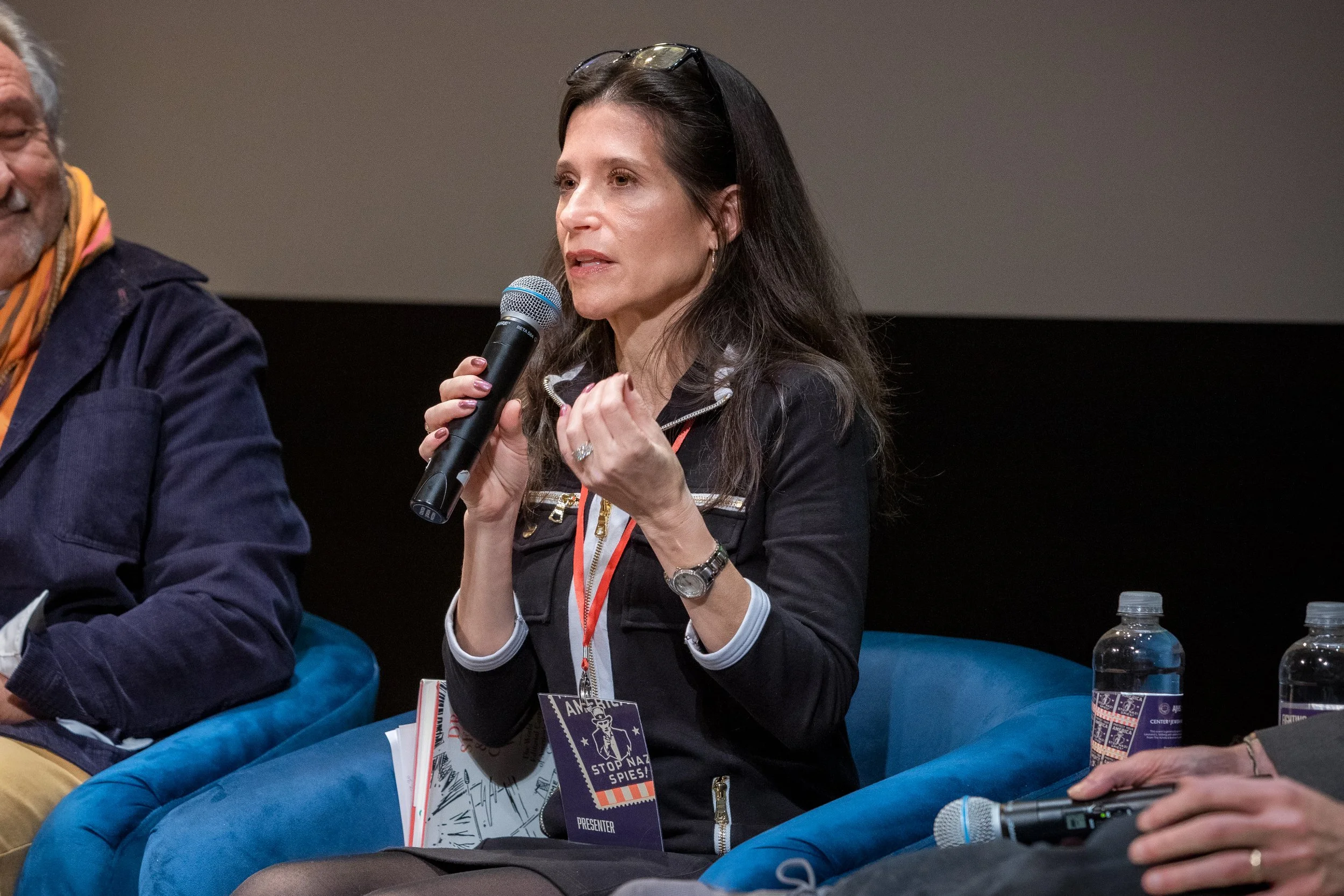 Samantha Baskind speaking  at a panel discussion.