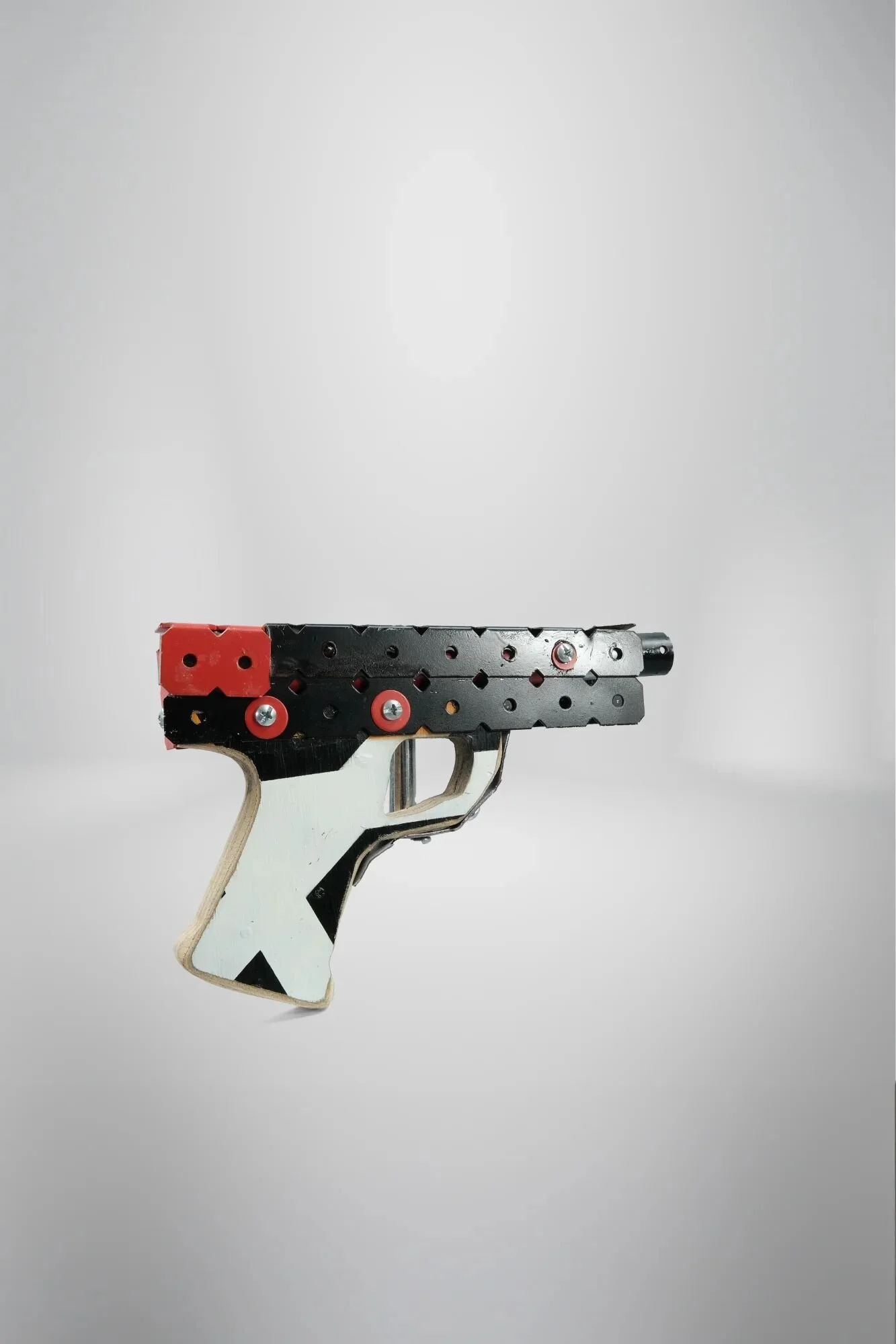 Glock defensive pistol—most common defence weapon. The defence I cannot provide. Form without function. Power's shape without its capacity. The wrongness is the measurement.