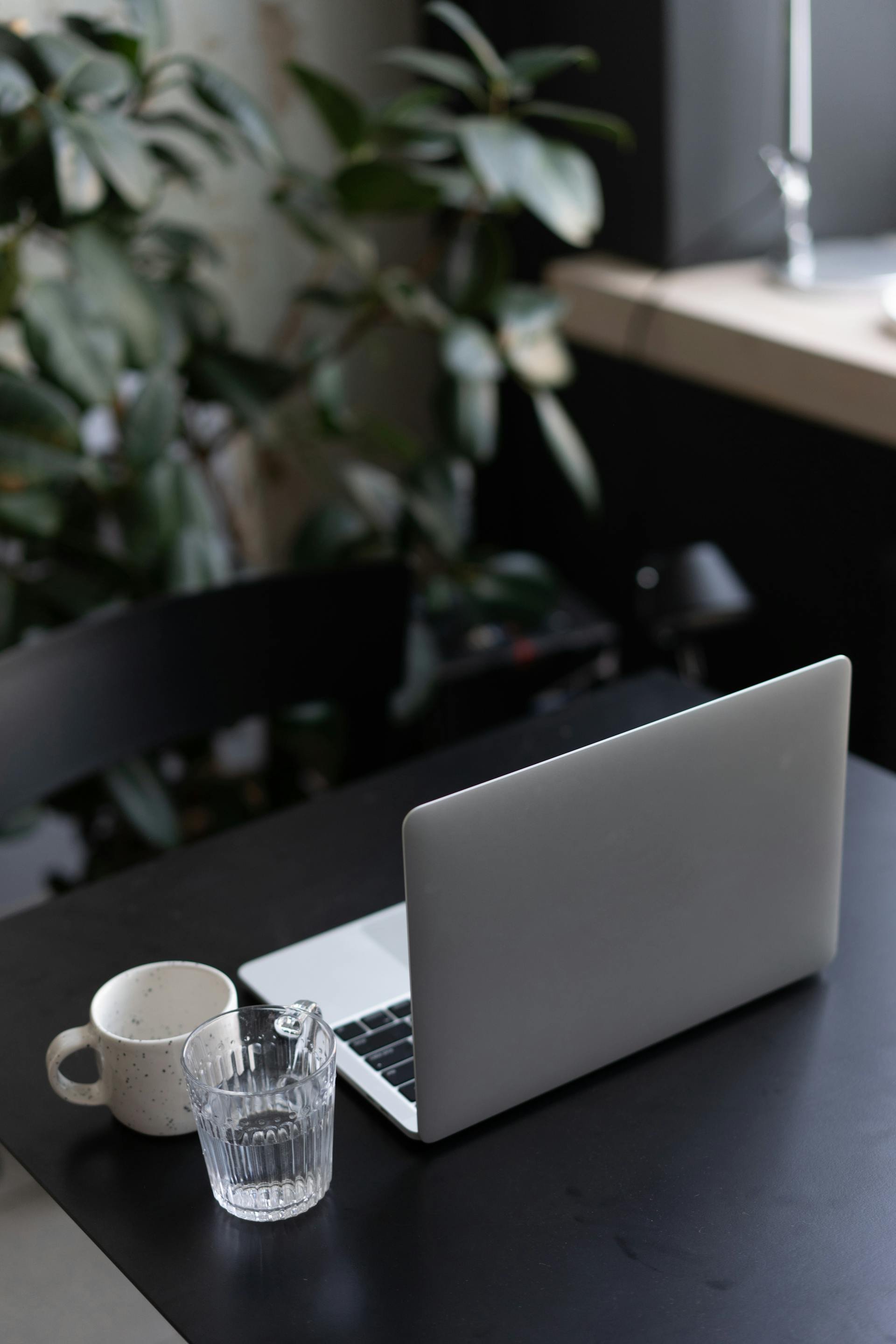 A laptop sitting on a table waiting for someone to book an appointment at Victoria Men's Health Clinic on Vancouver Island.