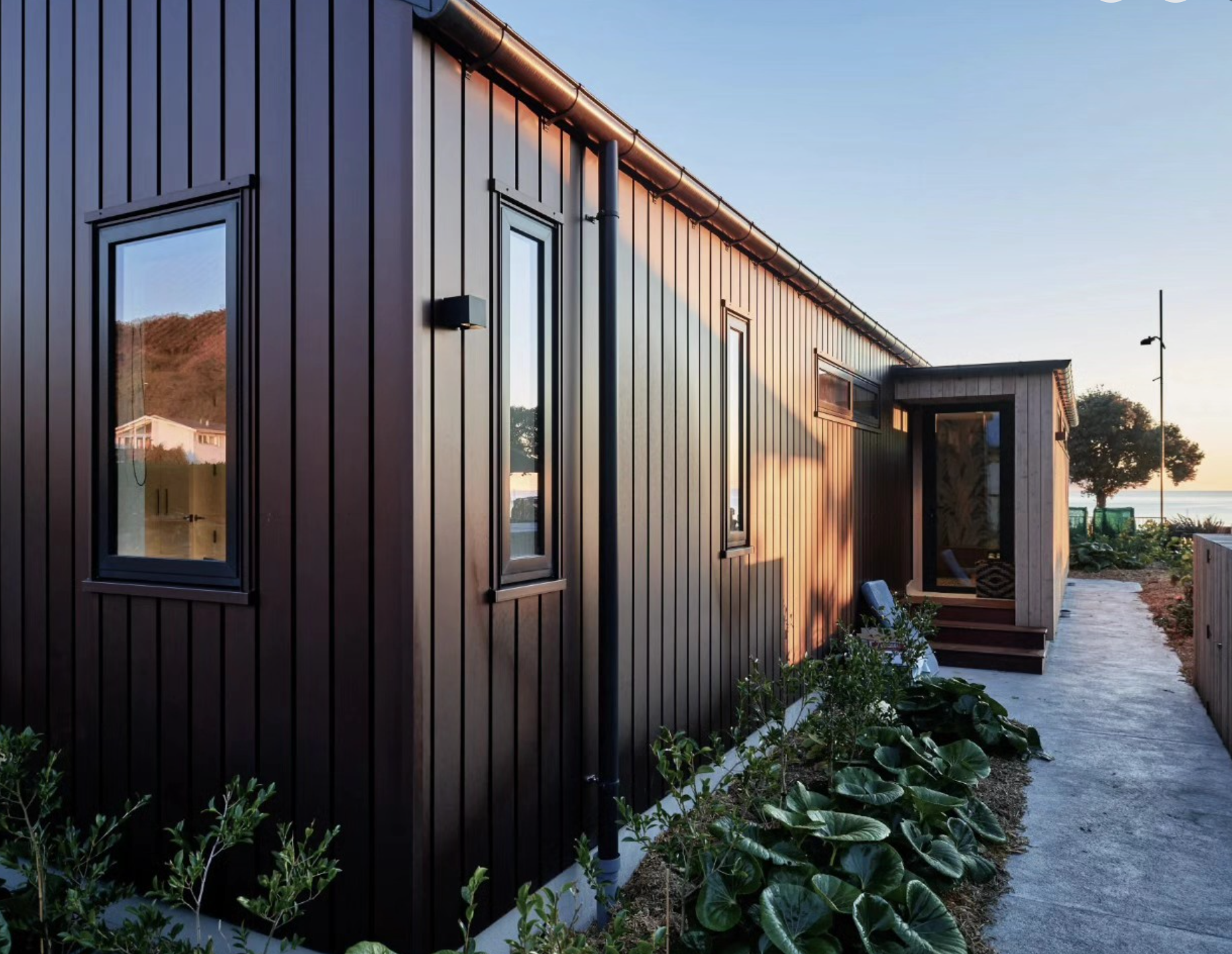 Modern residential home showcasing Flashclad aluminium cladding with clean lines and contemporary design