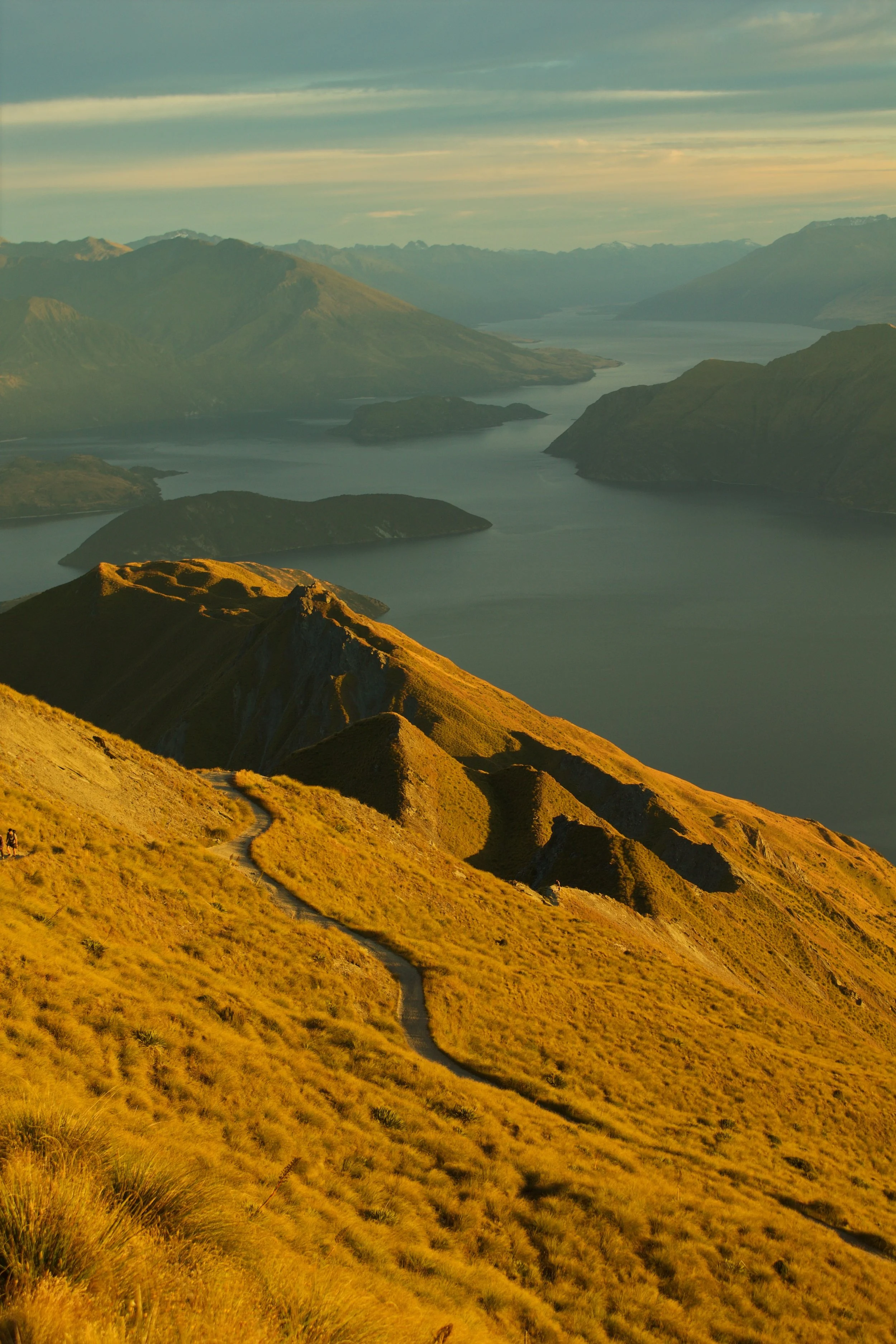 A golden Roys Peak in Wanaka New Zealand during sunrise