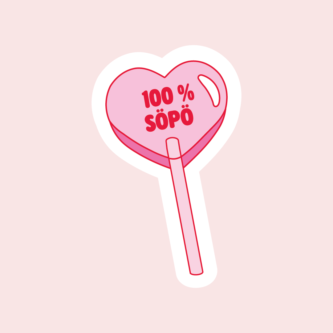 Sydämenmuotoinen tikkaritarra, sydämen keskellä lukee punaisella 100 % söpö