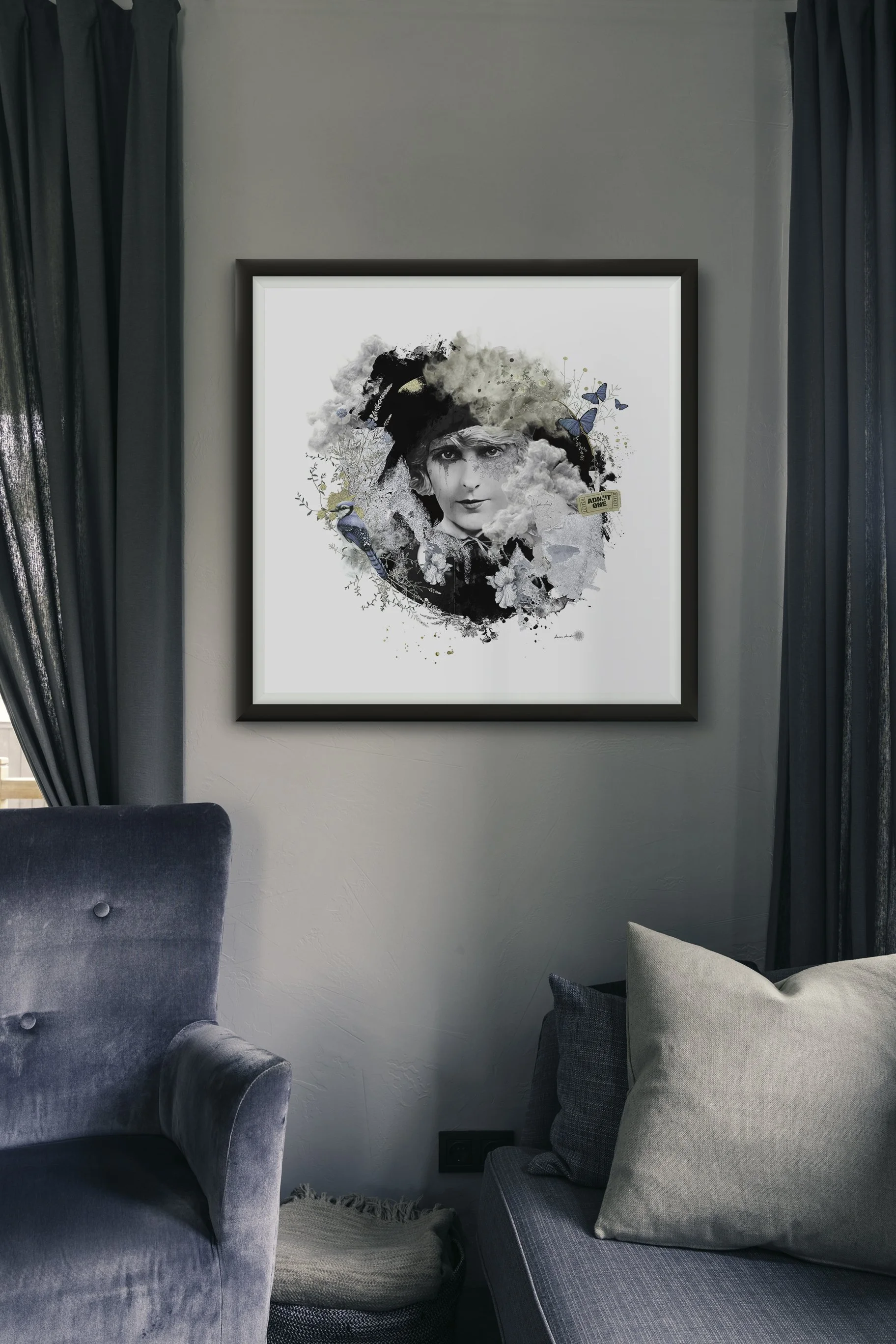 Une œuvre d'art abstraite de Pearl White avec une tête composée de nuages, de peinture noire, et de papillons bleus, affichée dans un cadre noir sur un mur dans un salon. Mixed Media Art
