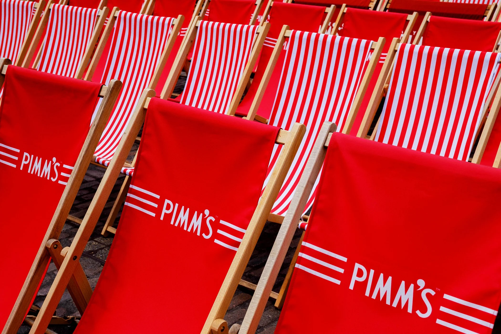 Branded Pimm's deckchairs at a summer event