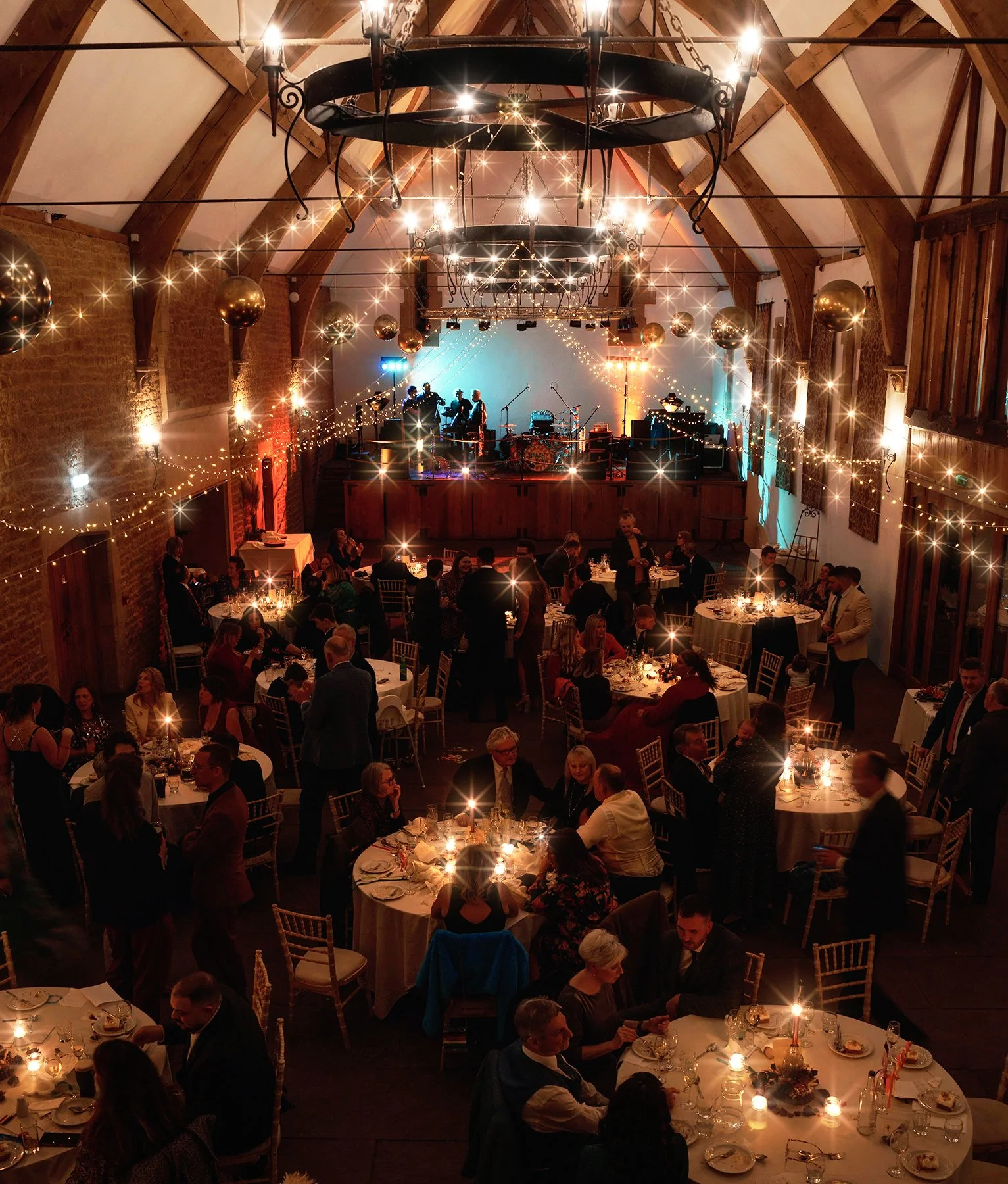 Evening celebration in a barn venue with a live band