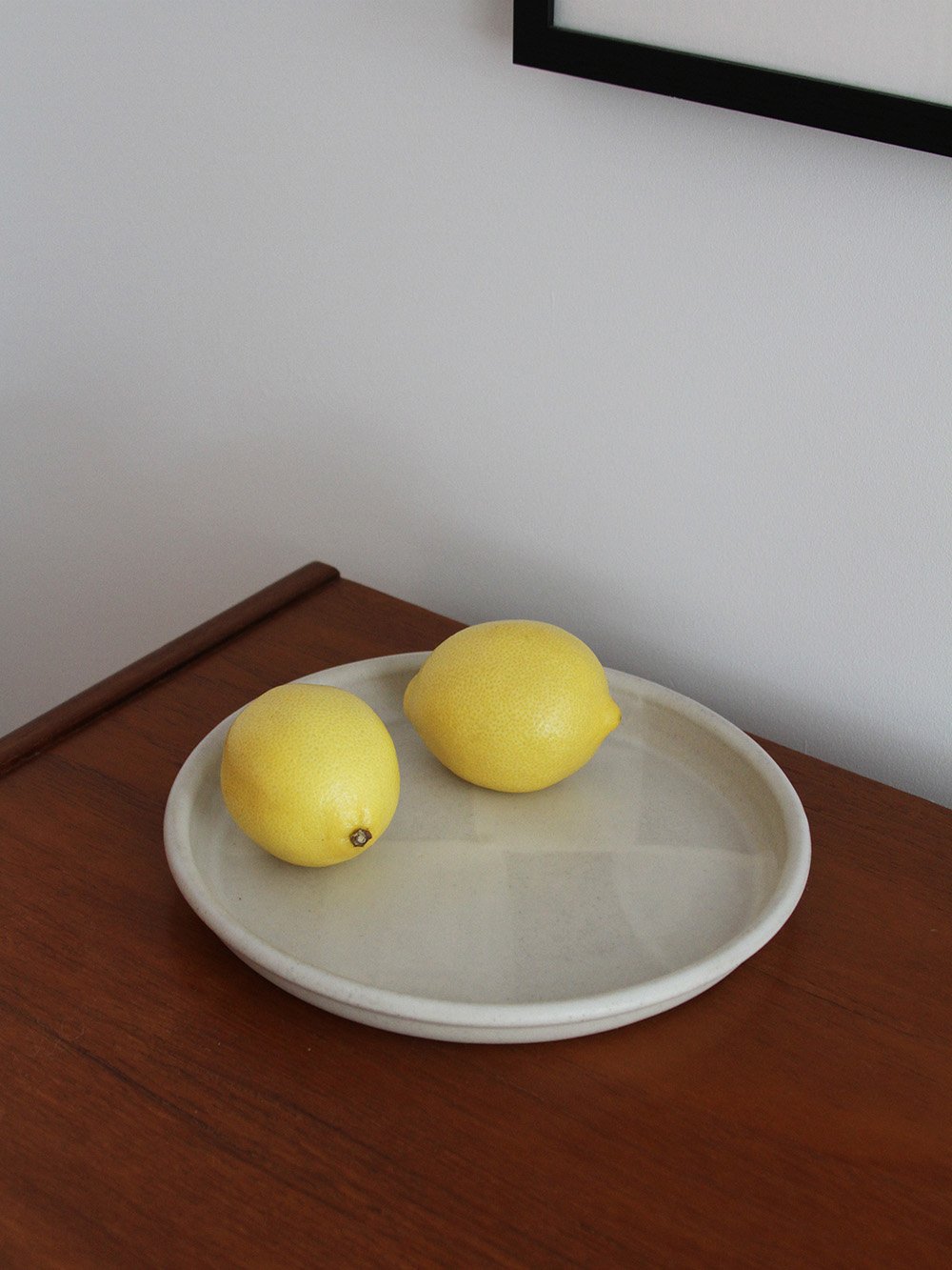 a dish with a lemon