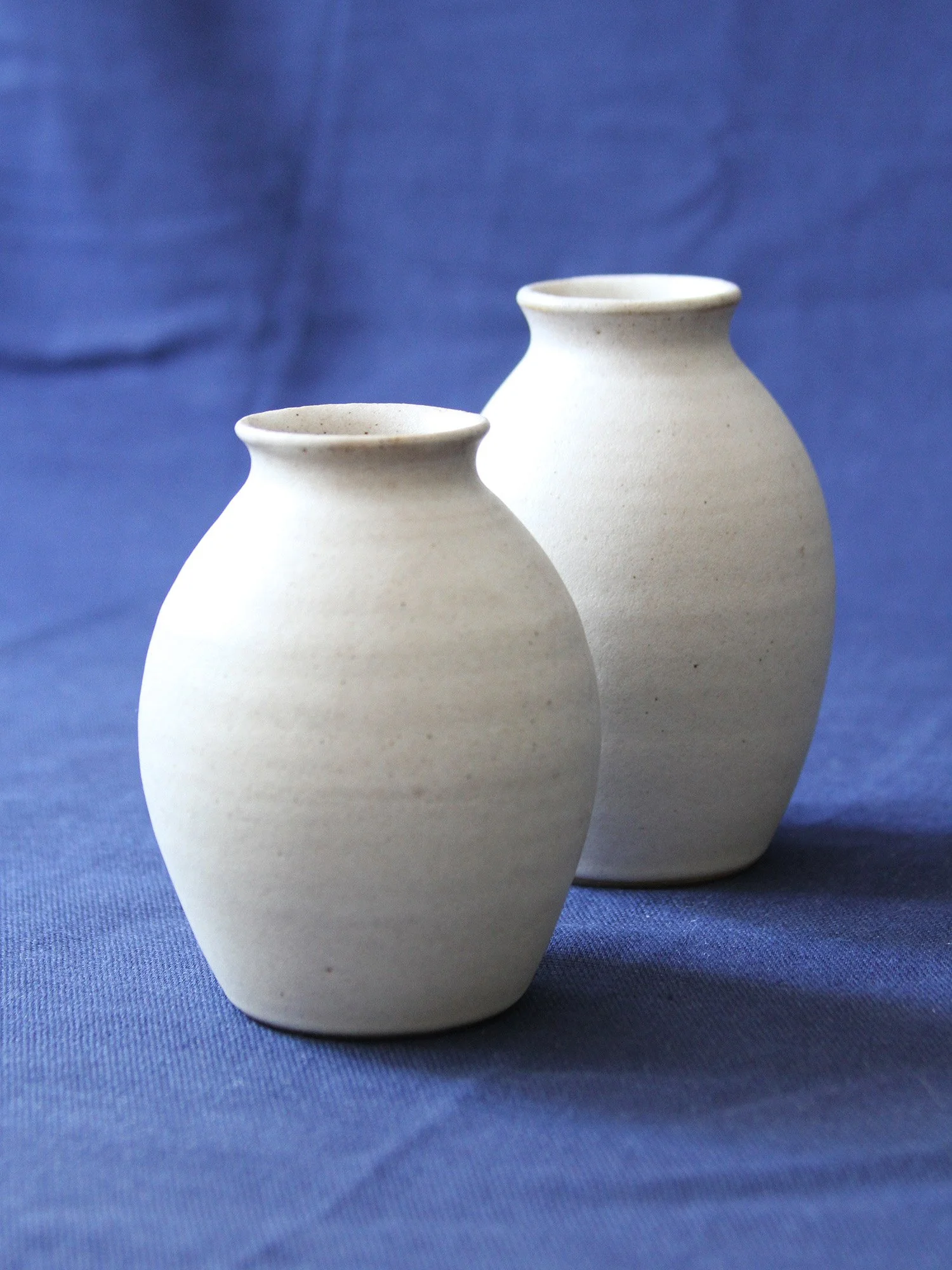 two white vases