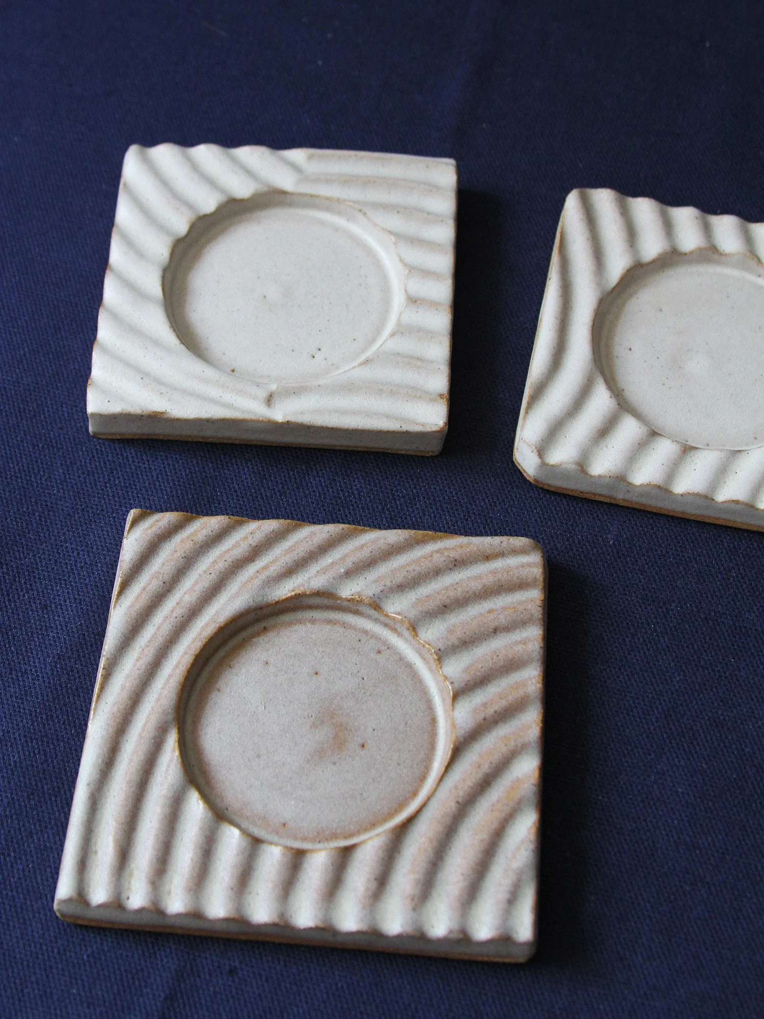 a collection of trinket dishes
