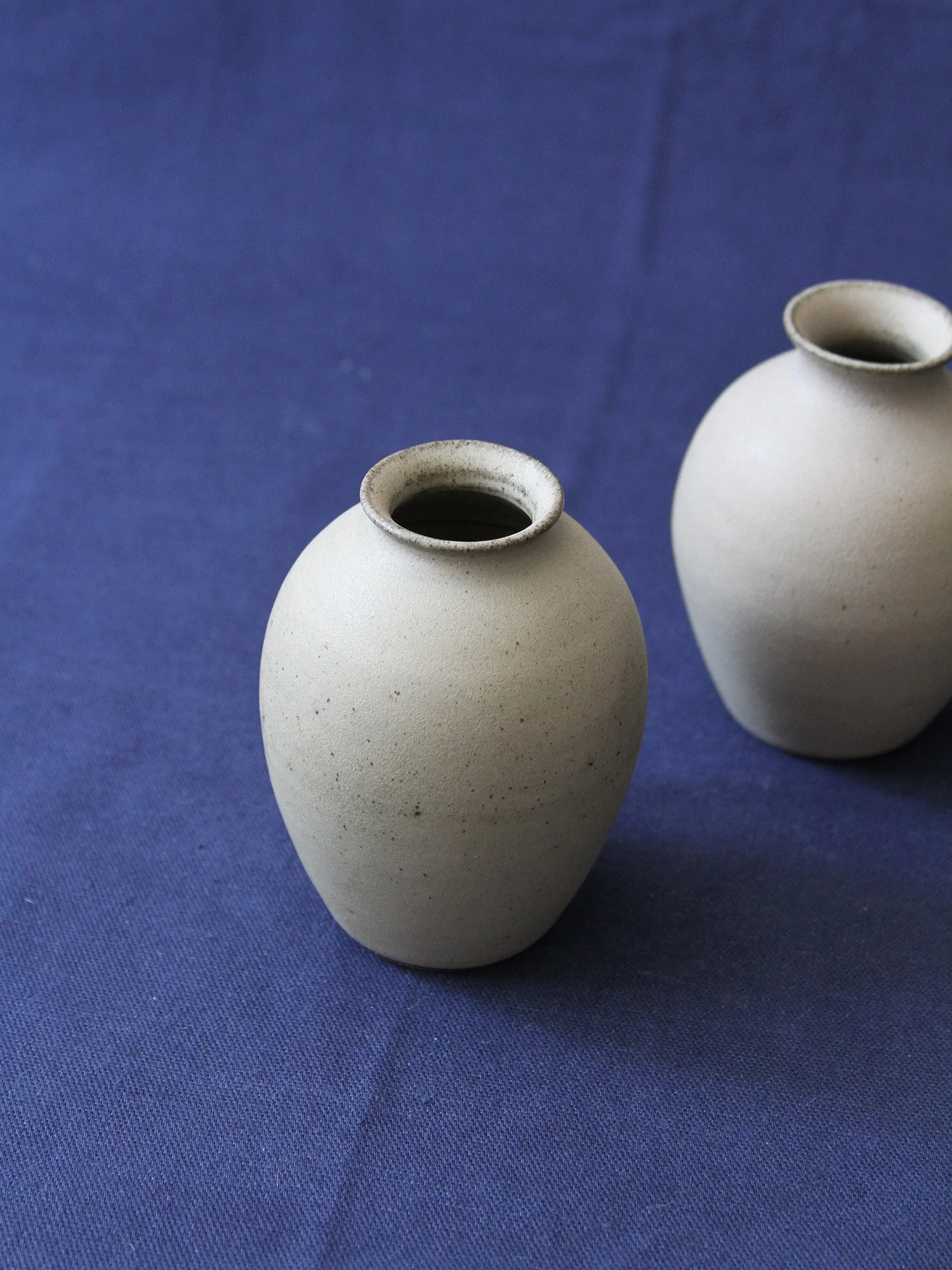 two grey vases