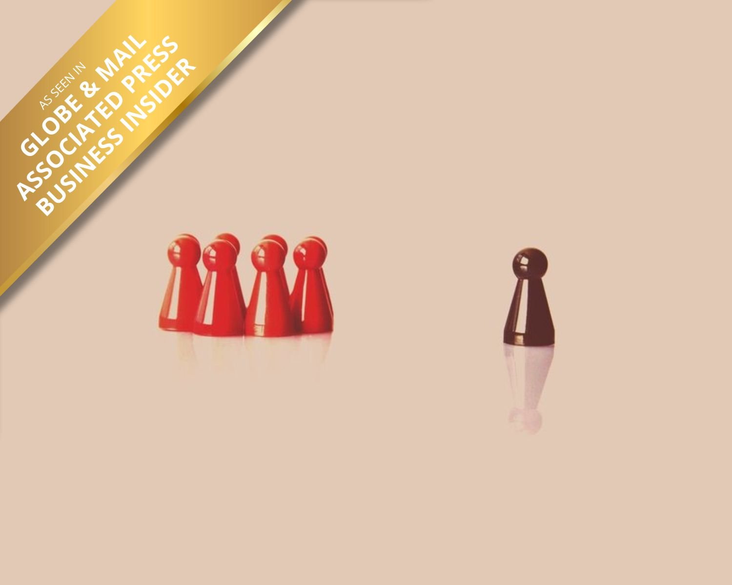 Red game pieces grouped together on the left and a single black game piece on the right on a plain background.