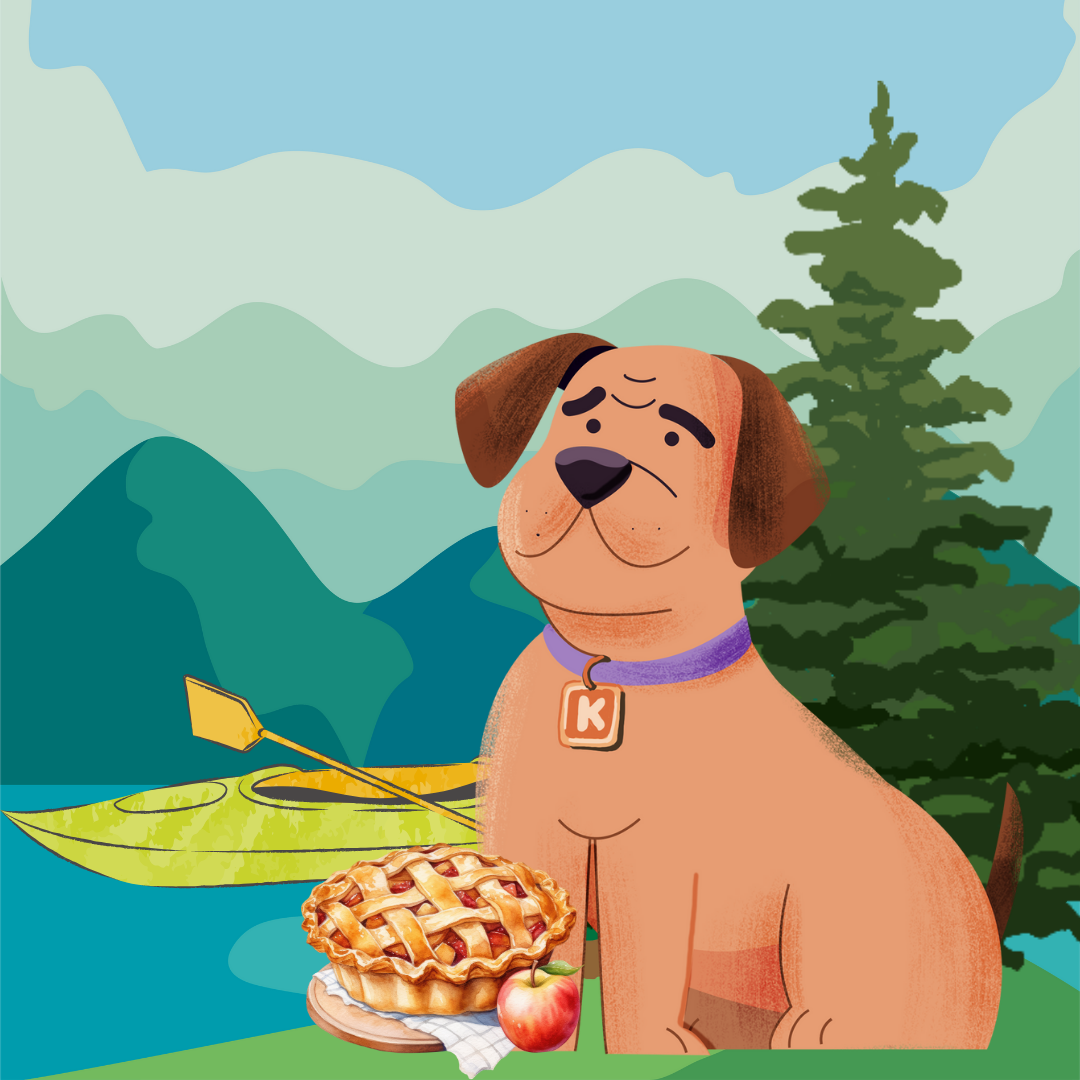 A cartoon dog with a purple collar and a tag with the letter 'K' sitting next to a pie, an apple, and a kayak on a lake with mountains and trees in the background.