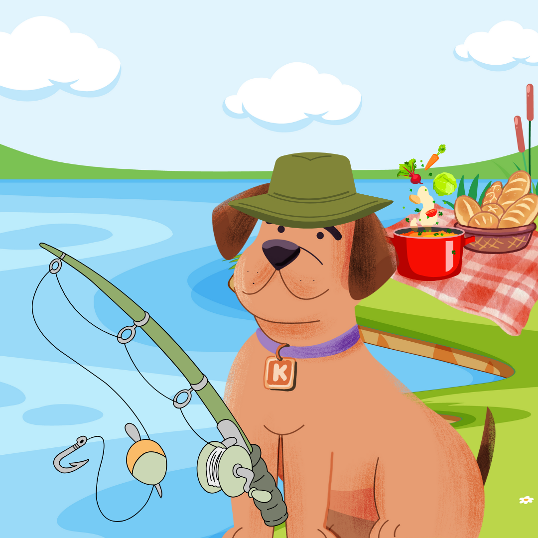 A cartoon dog wearing a hat and collar with a letter K is sitting by a lake fishing with a rod, and a picnic setup with bread, vegetables, and a pot of soup is in the background.