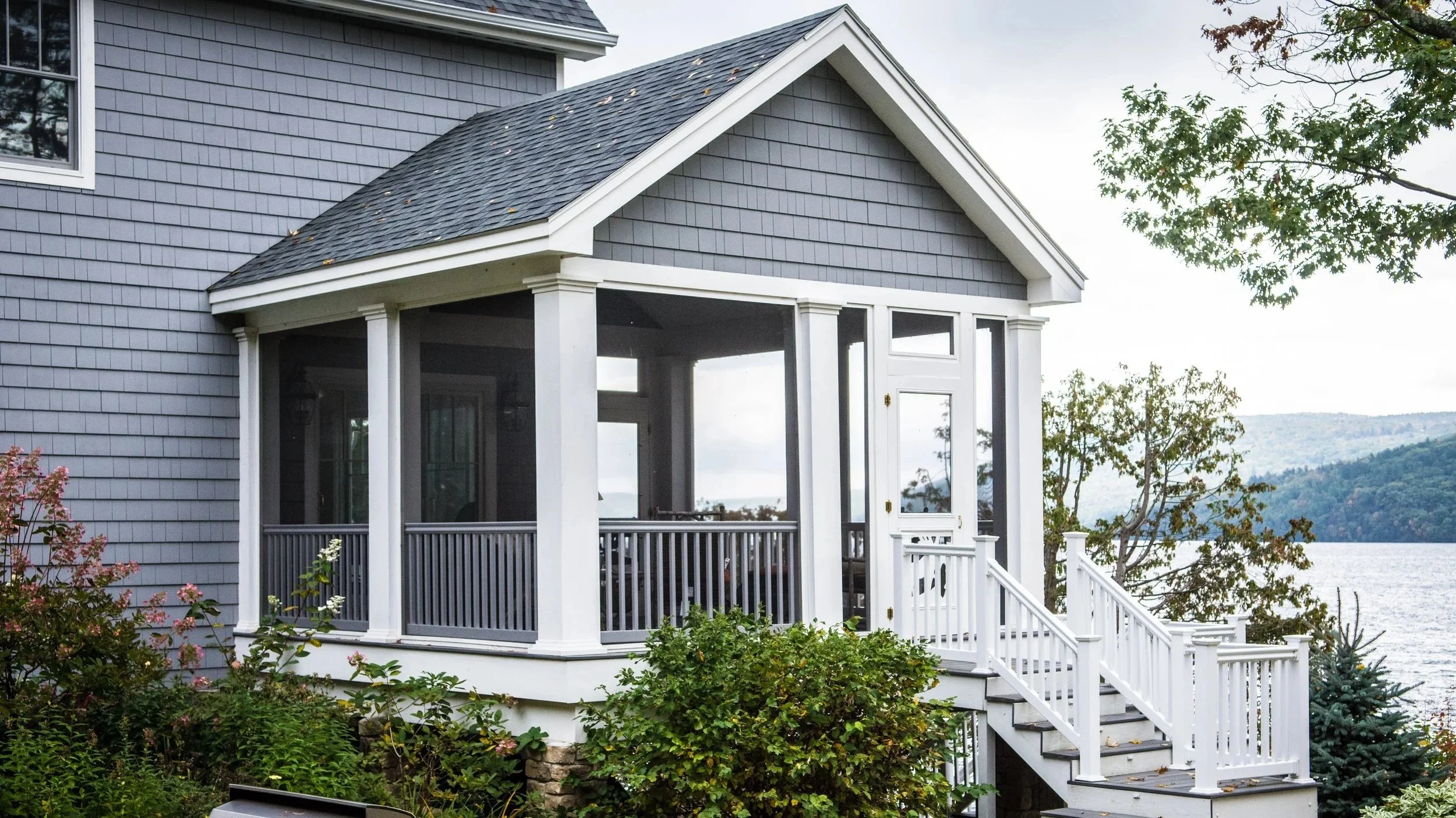 NC35_Blue_House_Cape_Style_Lake_Resized.jpg