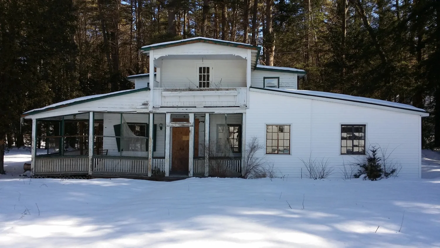 Large rustic wood home before transformation