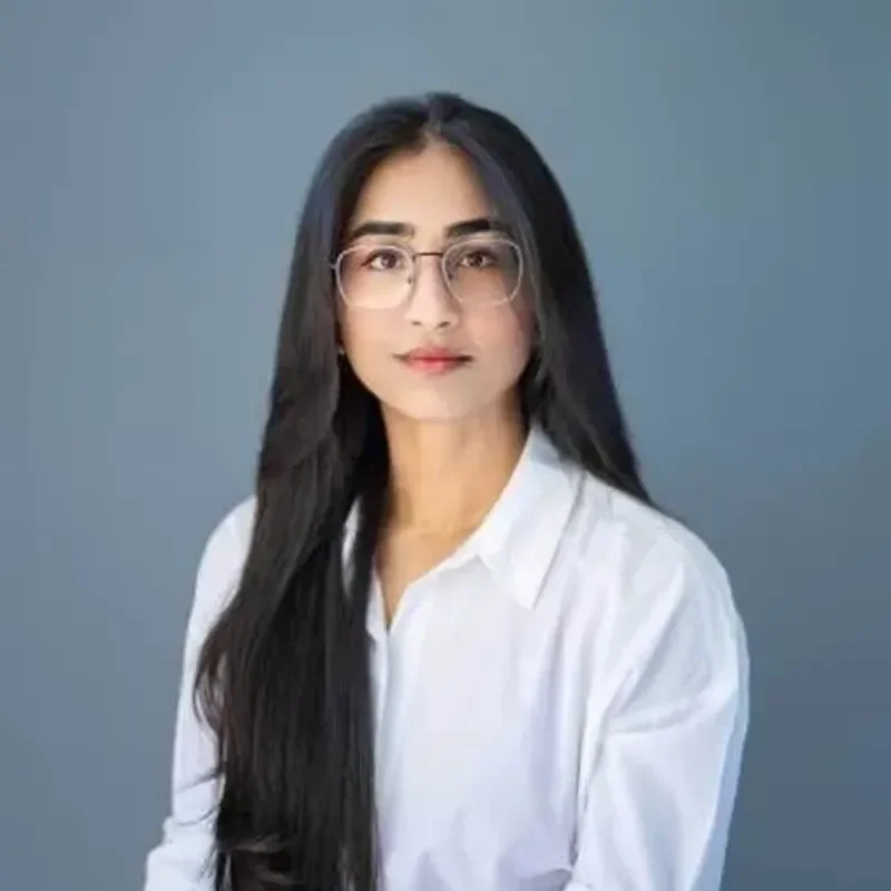 Zonaira Chaudhry in a white button up