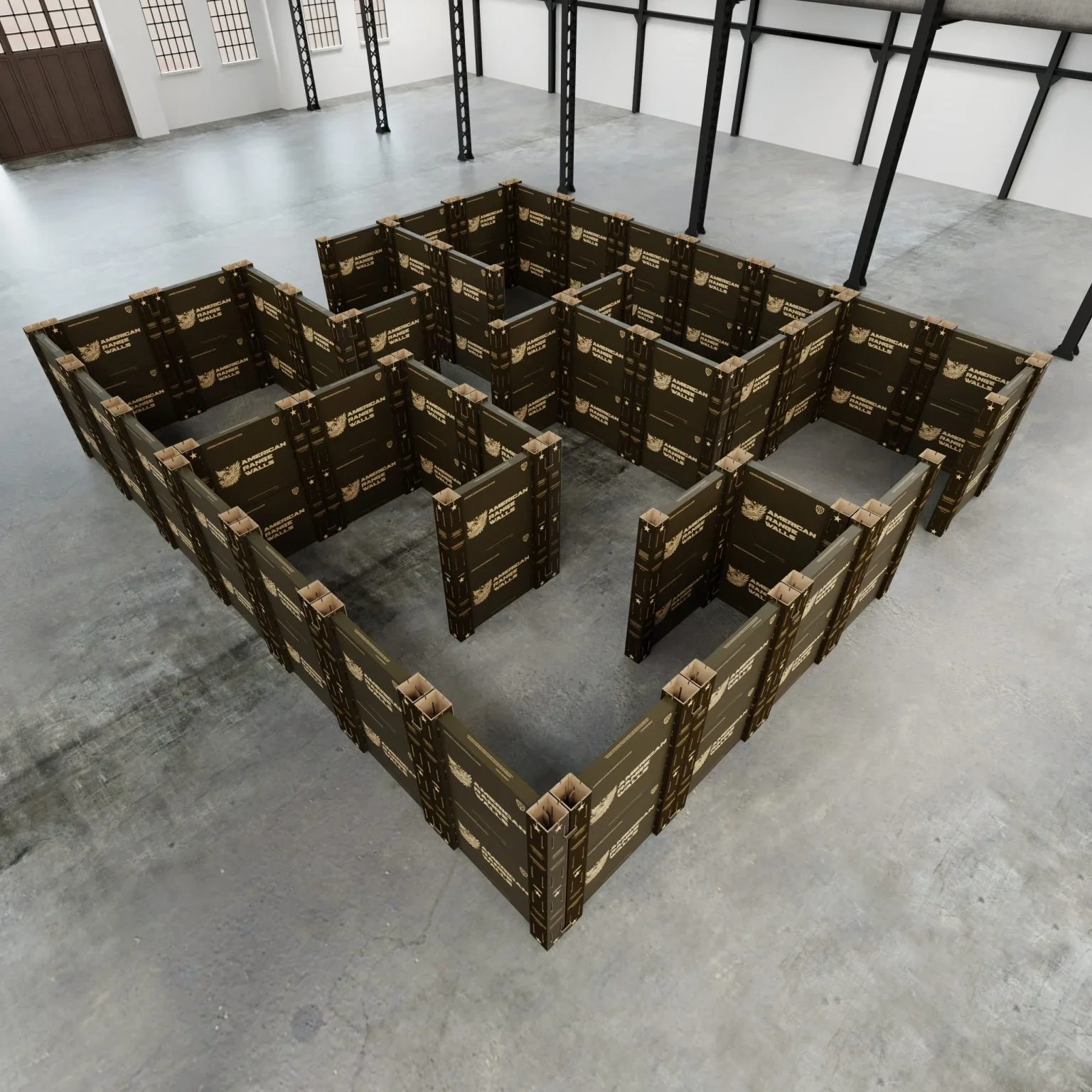 A square maze constructed with black and brown cardboard boxes inside an industrial-style room with concrete floors and metal beams.