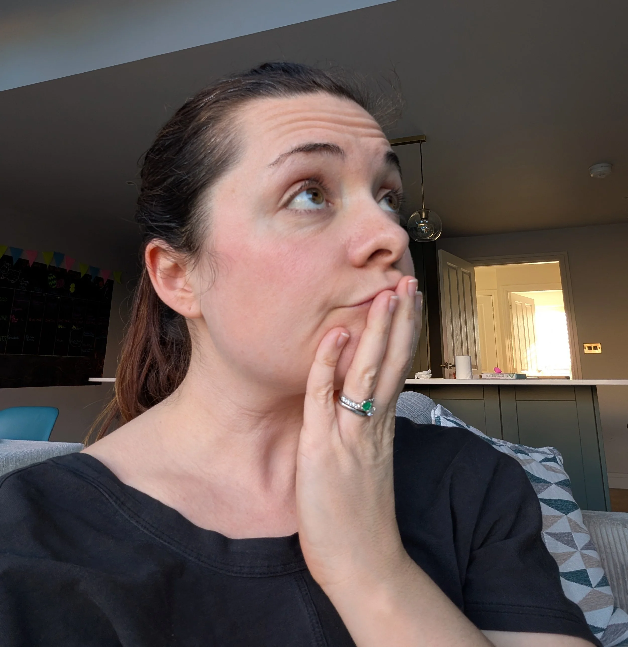 Photo of Ellen thinking intensely