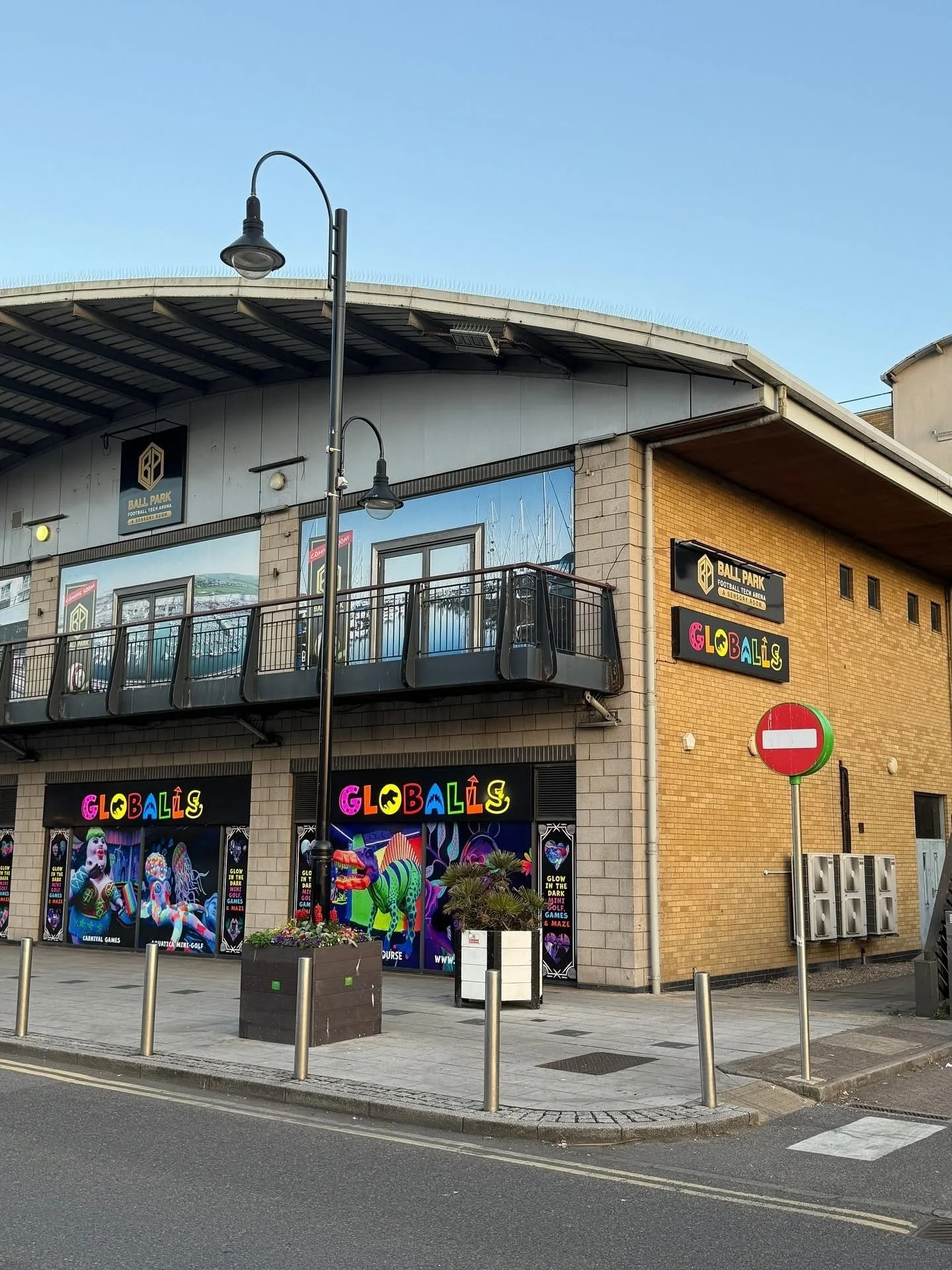 Ball Park football tech arena signs on the building at Brighton Marina next to Globalls