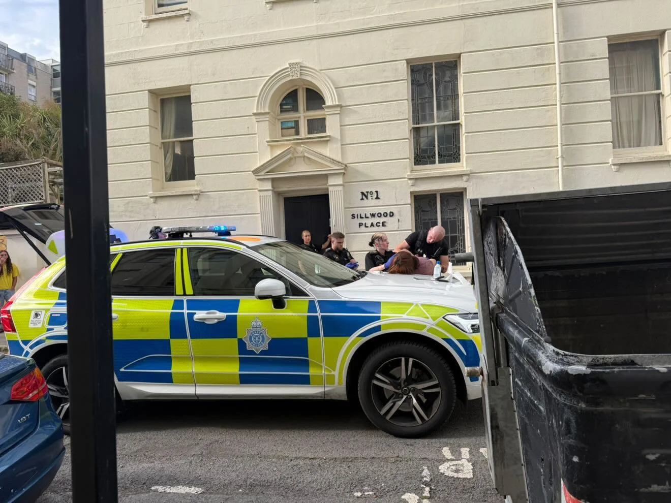 Man charged after two men injured in Brighton knife attack