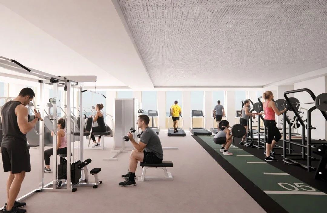 Proposed fitness suite at the new King Alfred with people using gym equipment by sea-view windows