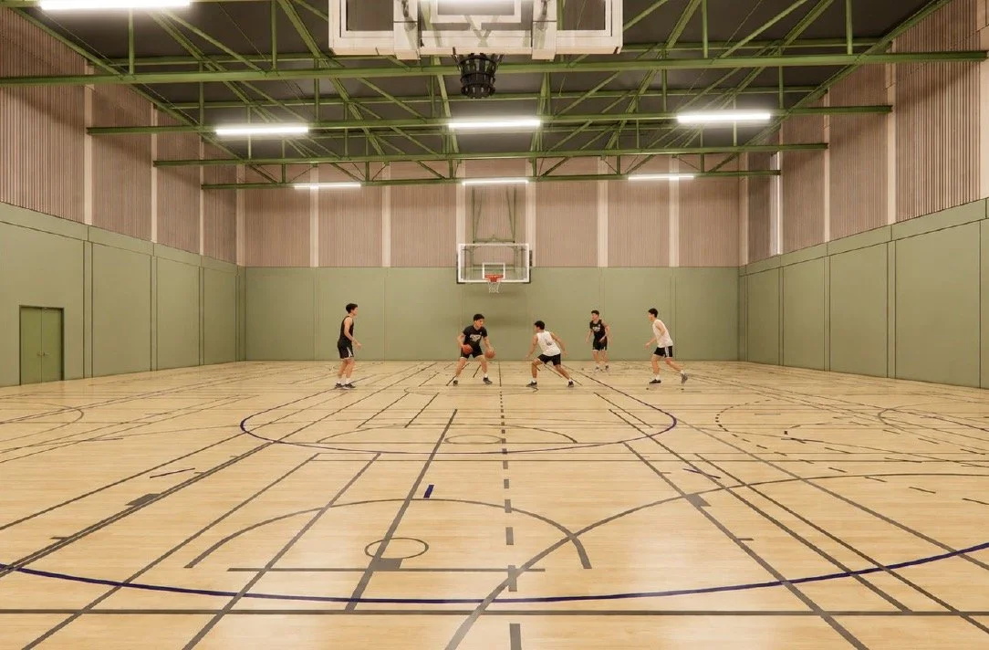 Proposed six-court sports hall at the new King Alfred with people playing basketball