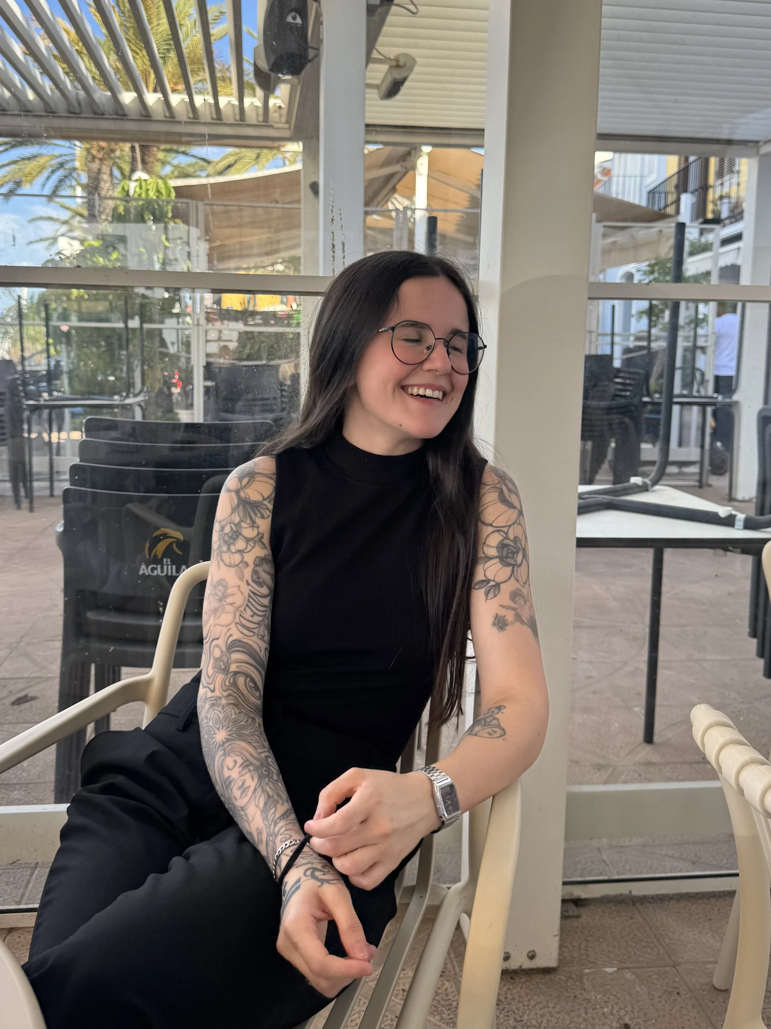 Spanish tattoo artist Copito smiling during an interview in Brighton