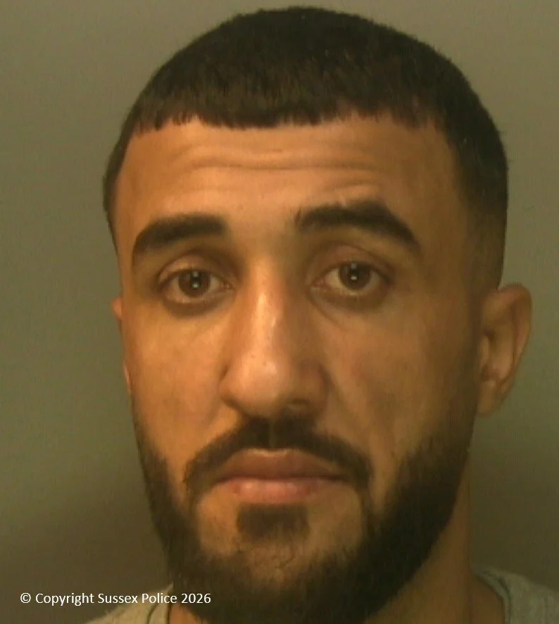 Sussex Police custody image of Abdulla Ahmadi, jailed for rape on Brighton beach