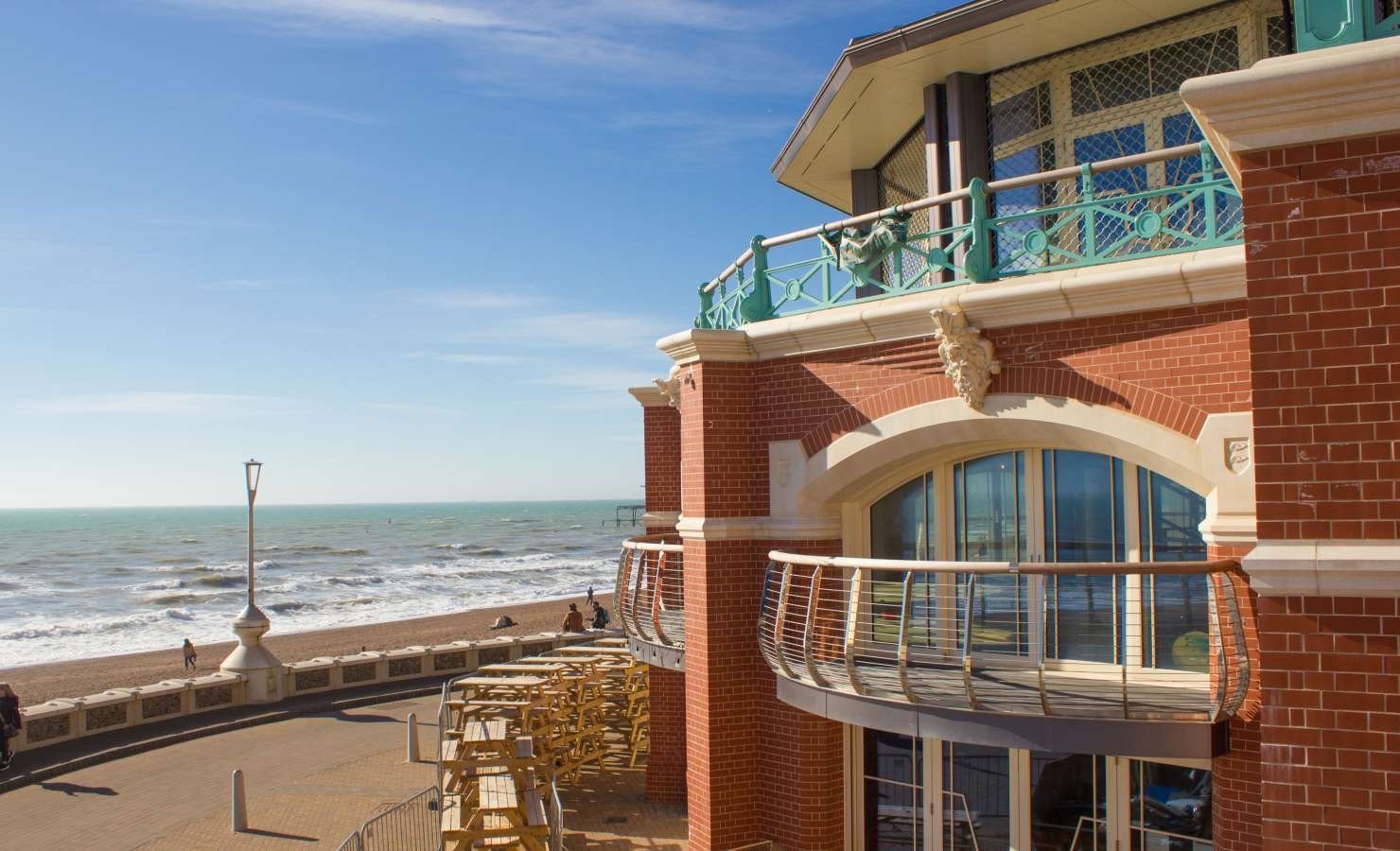Shelter Hall on Brighton seafront, built as part of Phase 3 of the King's Road arches renewal programme, with Brighton beach and the sea in the background